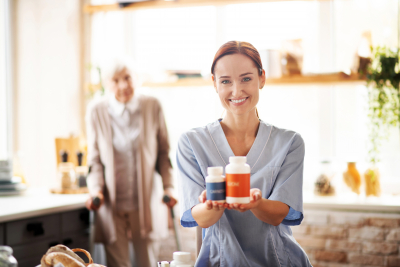 caregiver showing medicines