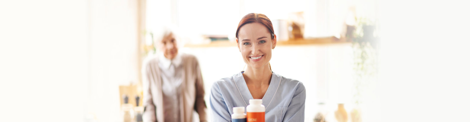 caregiver showing medicines